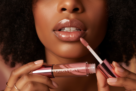 create a image of a  dark skin girl with a curly afro putting on some lip gloss showing her juicy lips  from a clear tube with a shiny metalic pink top filled with lip gloss that is strawberry and chocolate mixed to make a beautiful color that is  shiney  with specs of  mica for a sparkle effect and a glow on her lips we are calling  this lip gloss "guava lava " 